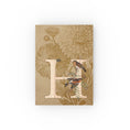 Load image into Gallery viewer, A vintage-inspired hard backed journal with a monogram and floral artwork on the cover.