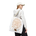 Load image into Gallery viewer, Person holding a tote bag with Astrology theme design and name 'Elizabeth'.