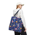 Load image into Gallery viewer, Person wearing a white hoodie and colorful butterfly-patterned bag on a white background