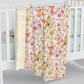 Load image into Gallery viewer, Floral and bird patterned crib sheet on a crib with hummingbirs and yelow pink florals