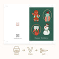Load image into Gallery viewer, A holiday greeting card design shown with fold and cut instructions. The front features a dark green background with illustrated gingerbread man, wrapped gifts, cat, and snowman motifs, plus the text 'Happy Holidays.