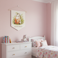 Load image into Gallery viewer, Children's bedroom with pink walls, white furniture, and decorative elements.
