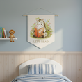 Load image into Gallery viewer, Children's room with a decorative banner reading 'Let's Read' above a bed.
