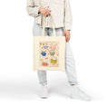 Load image into Gallery viewer, Person holding a tote bag with bunny cartoon characters on a white background
