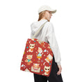 Load image into Gallery viewer, Person holding a tote bag with cat pattern on a white background
