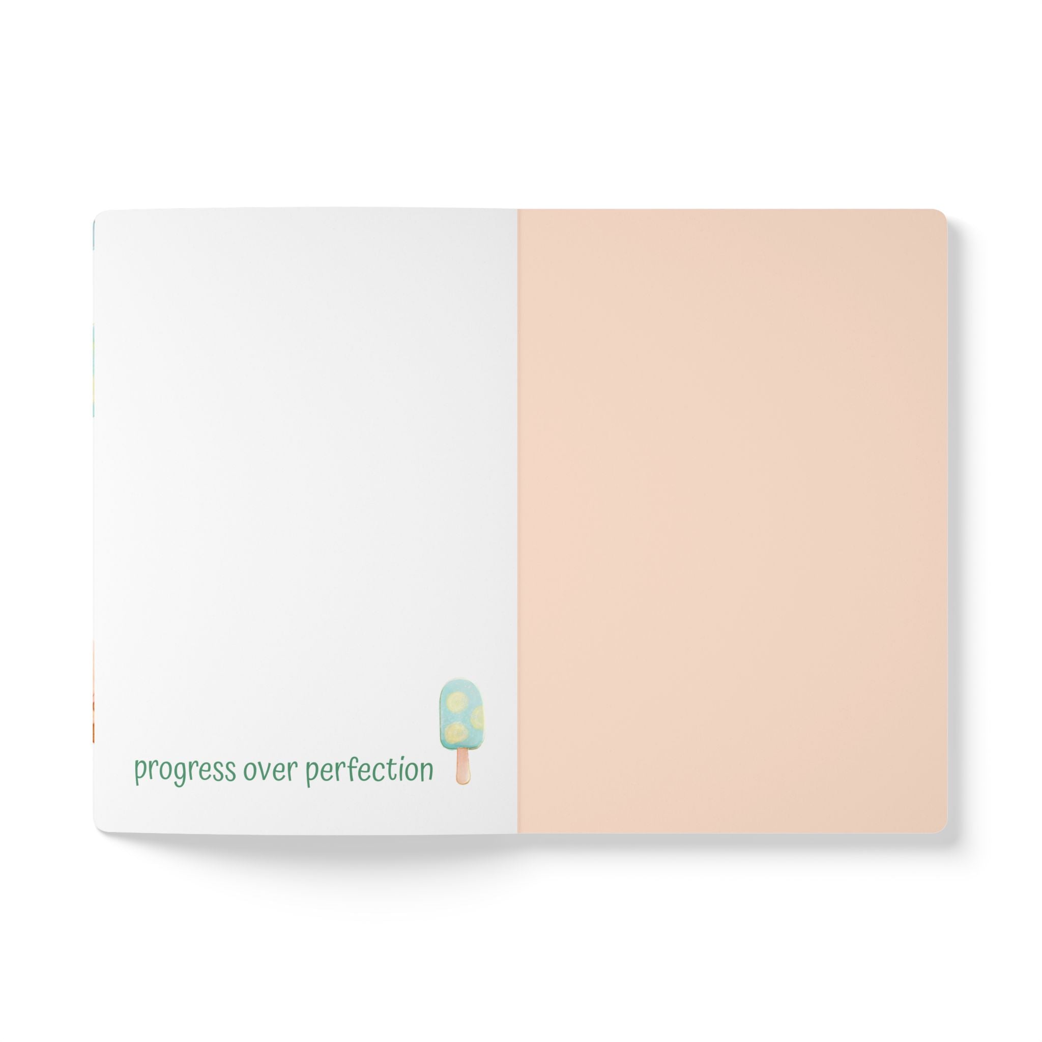 Two-toned notepad with 'progress over perfection' text and ice cream icon on a white background