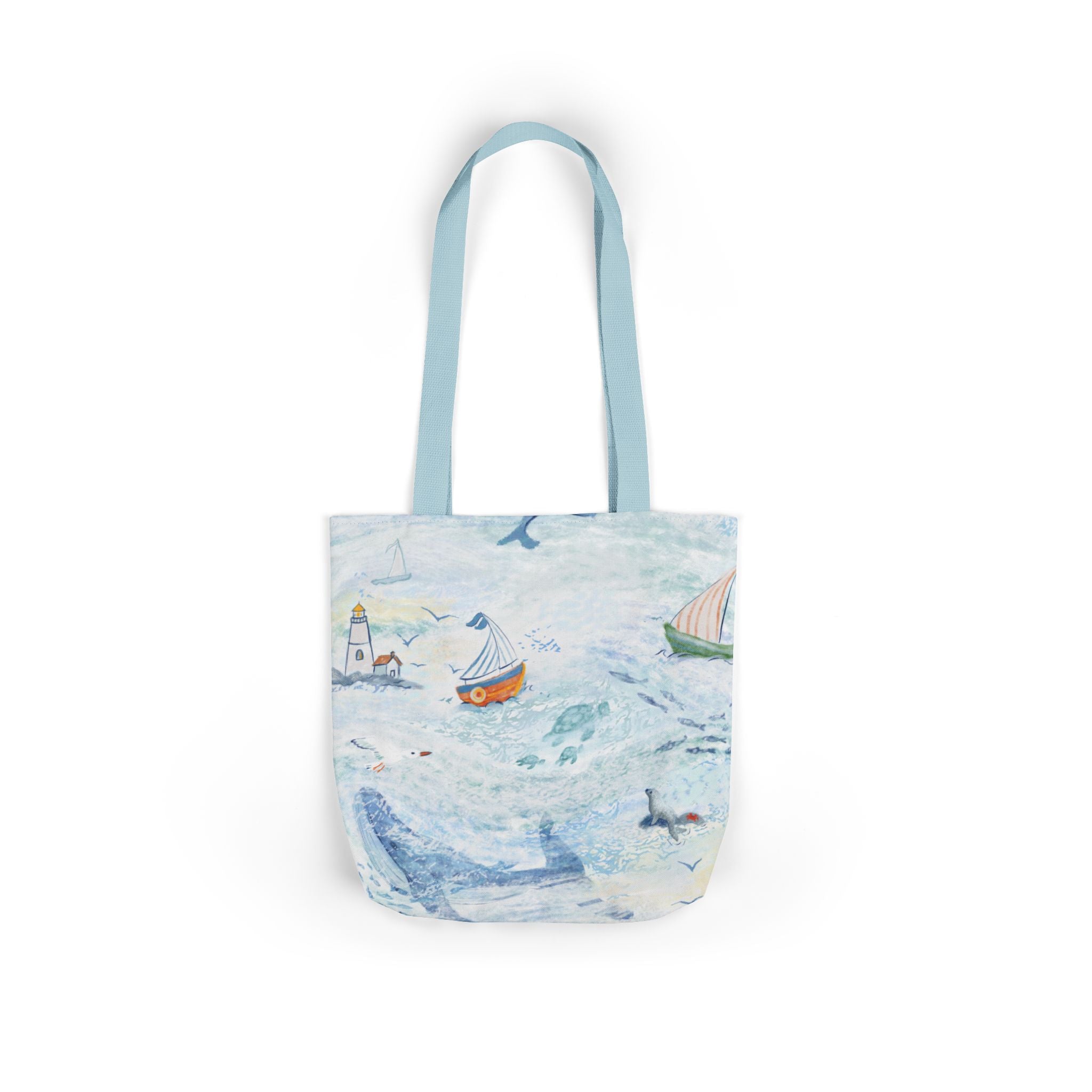 Tote bag with a nautical design featuring boats and a lighthouse on a white background