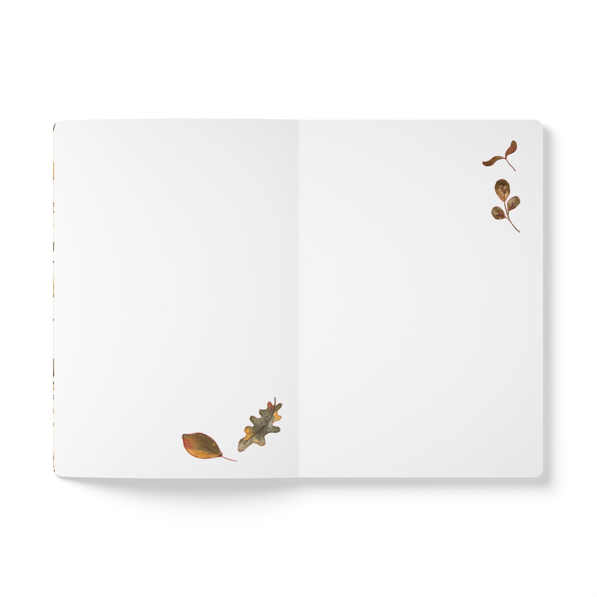 An open white notebook or journal laid flat on a white background, with small scattered autumn leaf illustrations in brown, tan, and muted green on the pages.