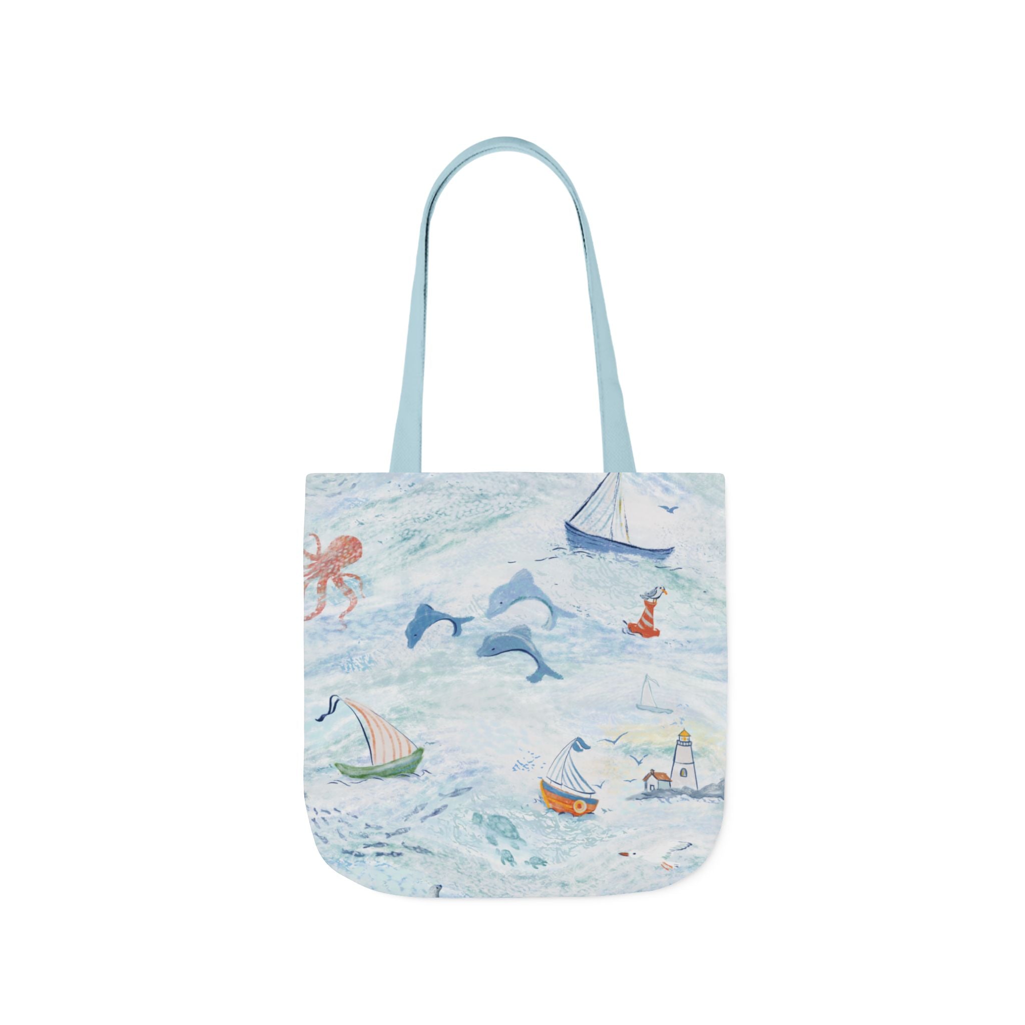 Tote bag with a nautical design featuring boats and sea creatures on a white background
