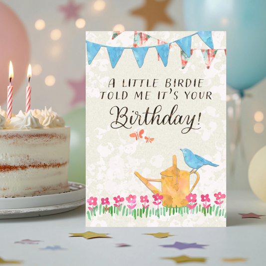 Birthday card with a bird and watering can illustration and a cake in the background.