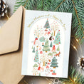 Load image into Gallery viewer, Printable Christmas card with festive illustrations on a white background, surrounded by Christmas decorations.
